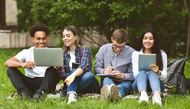 group of college students with their devices